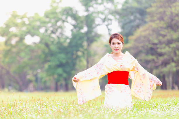 istock Asian young girl wearing a kimono 918452110