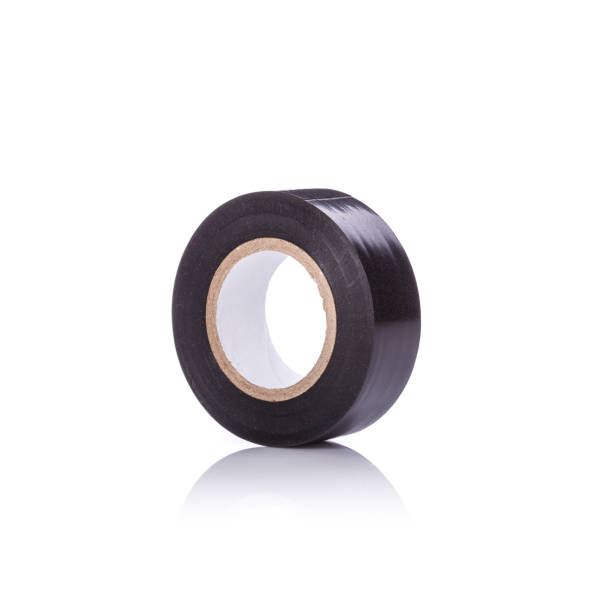 istock Roll new black tape for electrical. Studio shot isolated on white 918452318