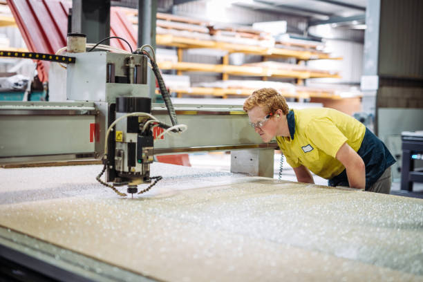 istock Engineer is testing the new automated machine in factory 918454706