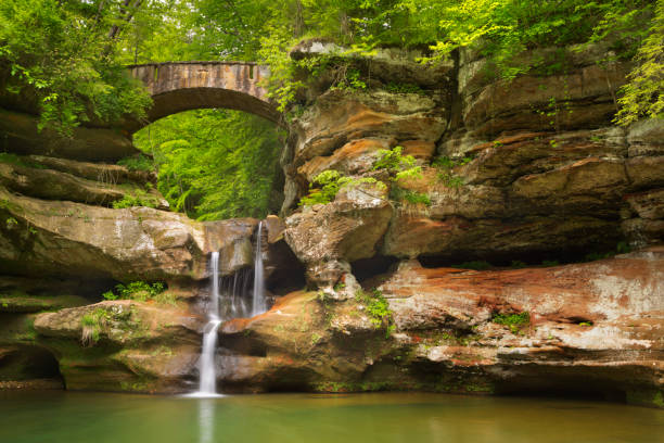 Waterfall and bridge in Hocking Hills State Park, Ohio, USA stock photo