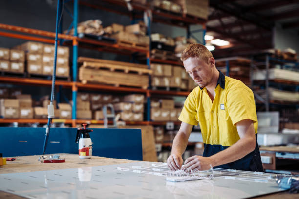 istock Electrician working with fuses and wires 918459028