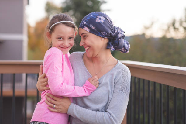 istock Mother with Cancer Hugging Daughter 918459120