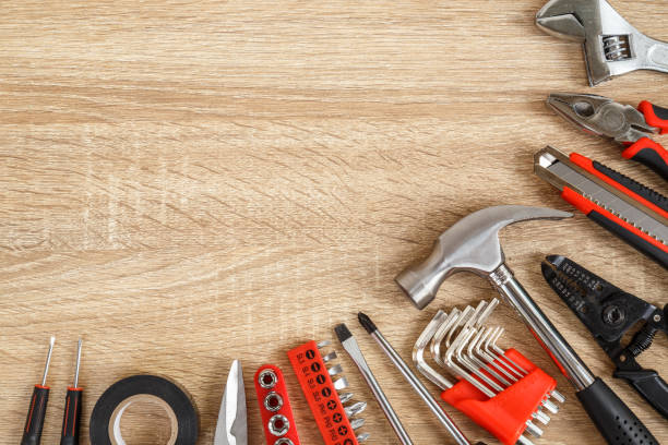 istock New of assorted work tools on wood with copy space for text 918463144