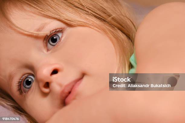 Girl Child Romantically Looking Into The Distance Stock Photo - Download Image Now - 2017, 2018, Apartment