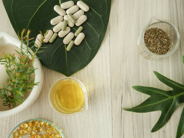 istock alternative herb medicine. herbal vitamin on white background. 918474622