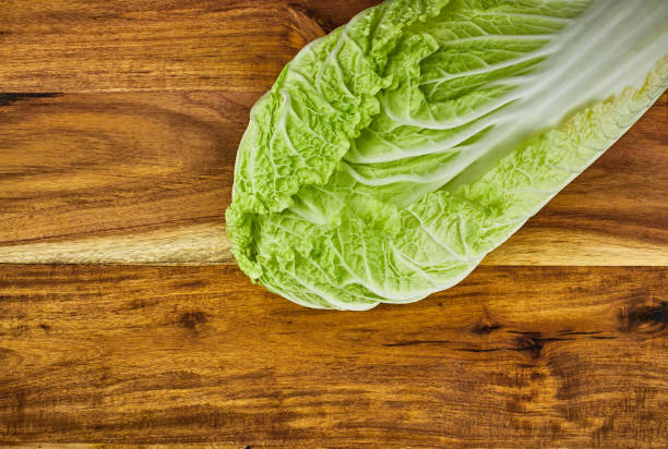 istock Chinese leaf lettuce on a wooden board 918480876