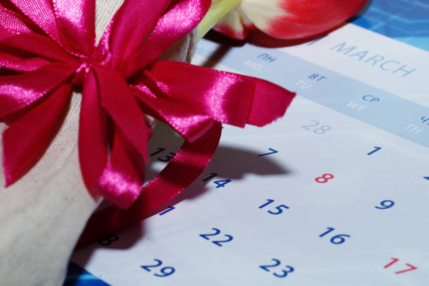 istock Women's Day - March 8. Calendar with tulips and festive decorations 918480902