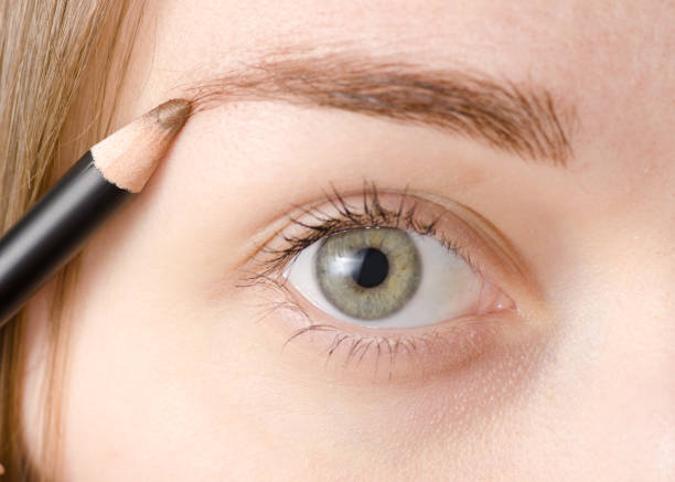 istock Female eye natural eyebrow pencil 918484620
