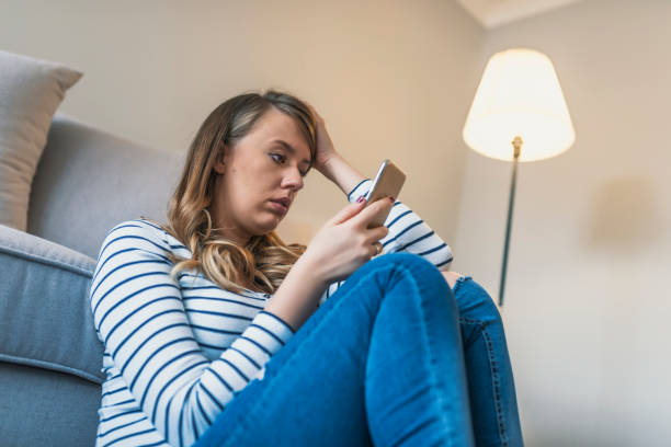 istock upset sad skeptical unhappy serious woman talking texting on phone displeased with conversation 918492014