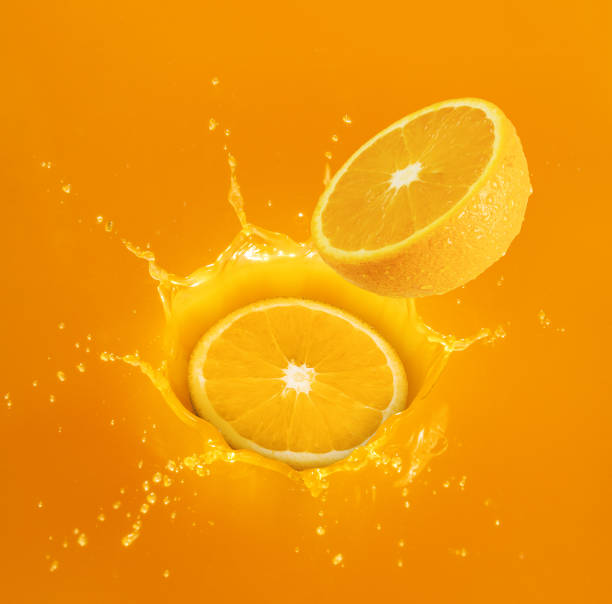 istock orange juice drop and splash, citrus fruit 918492242