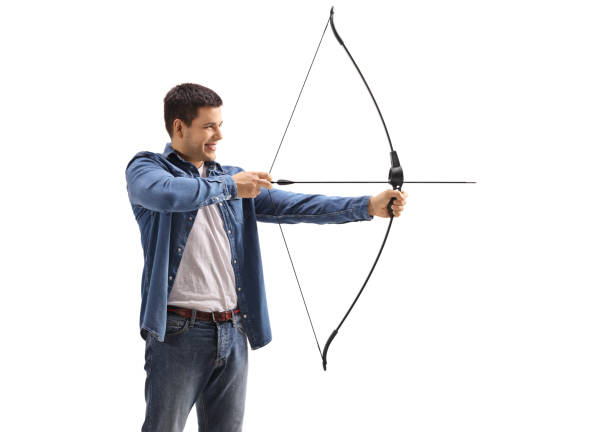 istock Young man aiming with a bow and arrow 918493922