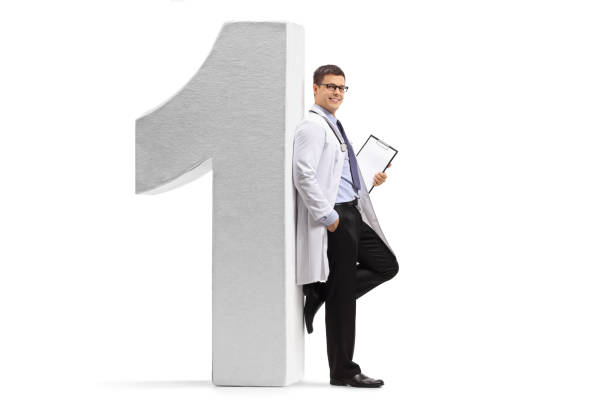 istock Doctor leaning against a number one figure 918494118