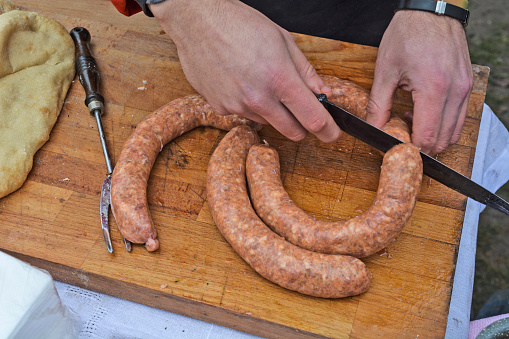 Freshly produced sausages that are put up for sale.