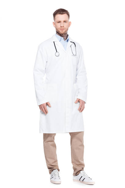 istock handsome professional doctor in white coat with stethoscope, isolated on white 918494906