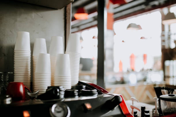 istock White paper cup take away on coffee machine in coffee shop restaurant 918497846