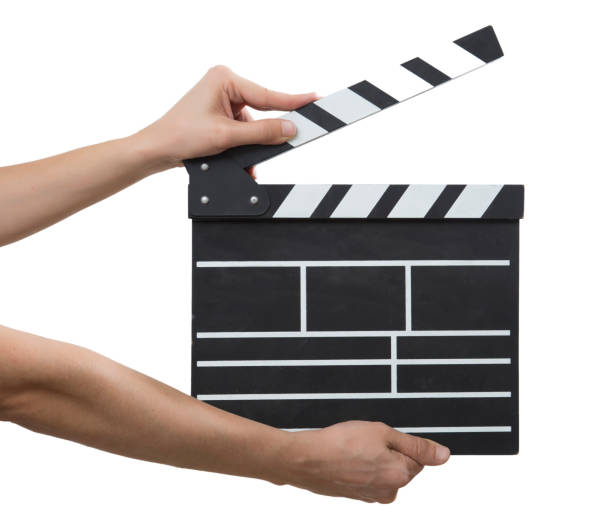 istock Movie Slate board in hand isolated 918501960