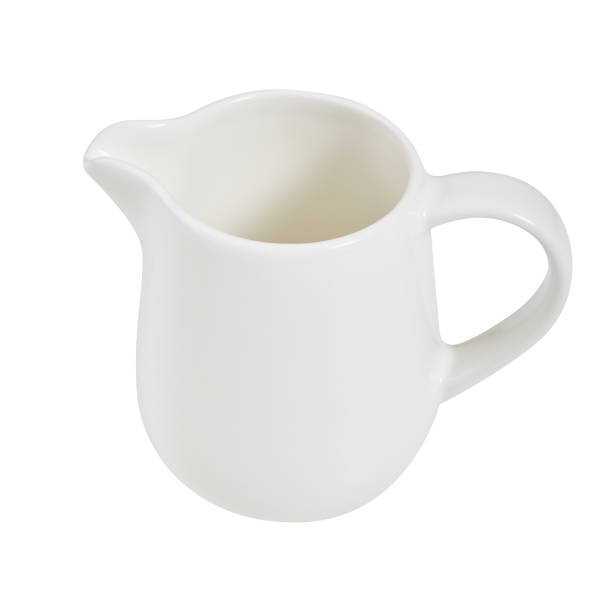 istock A jug for milk. White. View from above. For coffee. Isolated. For your design. 918505734