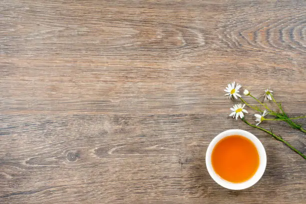 cup of organic camomile tea, healthy lifestyle concept