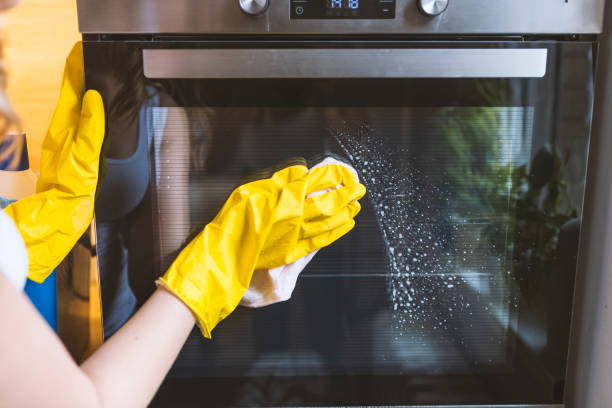 istock Girl polishing kitchen 918508458