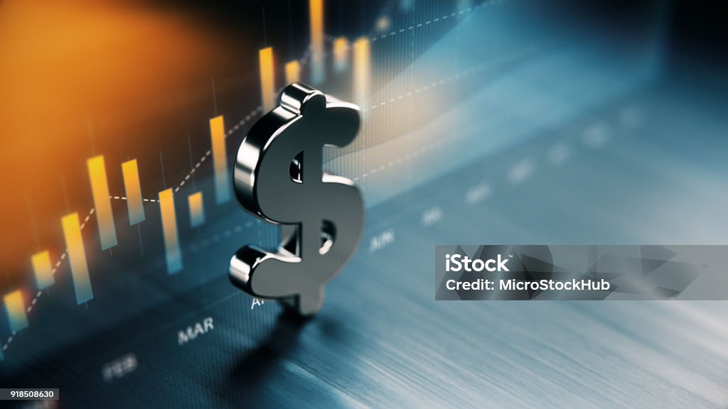 Símbolo de dólar americano sobre la superficie de la madera frente a un gráfico - Foto de stock de Finanzas libre de derechos