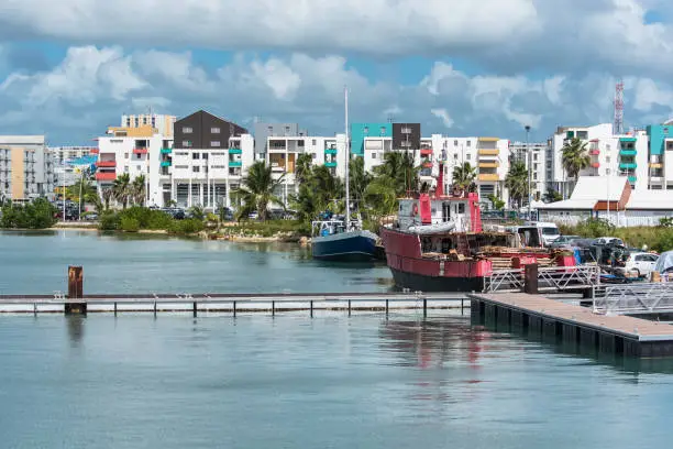 Guadeloupe, Pointe à Pitre city, panorama of the harbor from the sea, buildings and boats