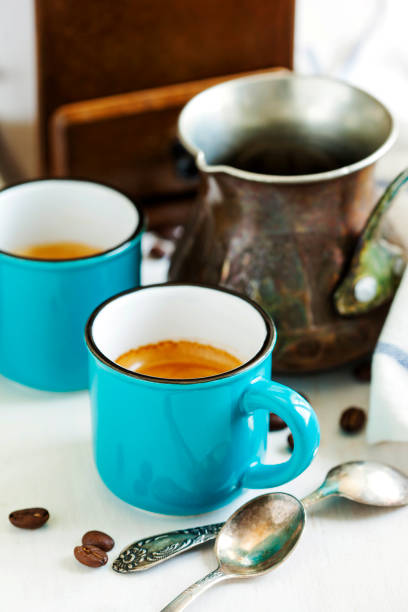 istock Cups of coffee and coffee pot. 918510262