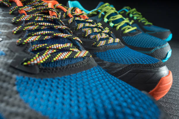 istock Colorful running shoes / exercise trainers on a gym floor 918512154