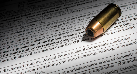 Ammo with gun transfer paperwork with dishonorable gun discharge question highlighted