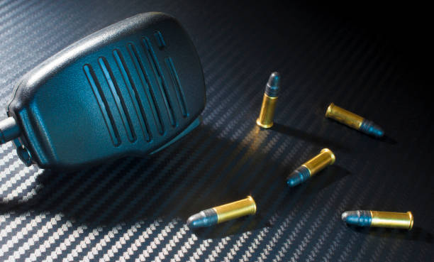 istock Ammunition and a police style microphone 918513004