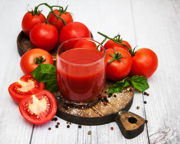 istock Glass with tomato juice 918513182