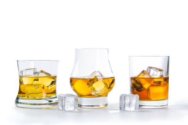 istock Strong alcohol drinks - whiskey, bourbon, scotch on white background 918516374