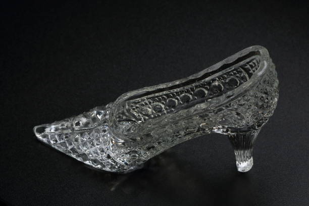 istock Crystal Cinderella Shoe on a dark background. Decorative accessory 918524860