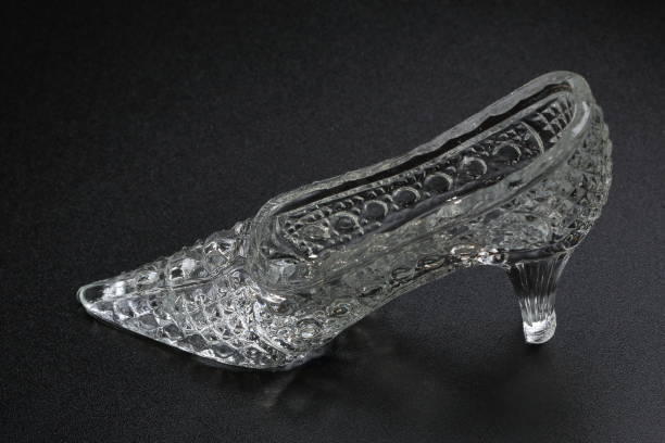 istock Crystal Cinderella Shoe on a dark background. Decorative accessory 918525370