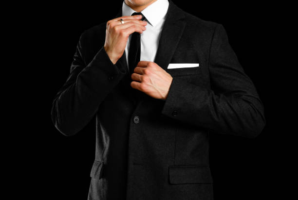 istock Businessman in a black suit, white shirt and tie. Studio shooting 918530612