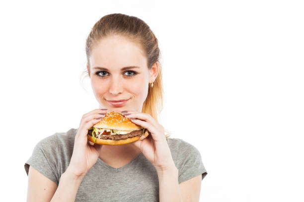 istock Lovely woman with a hamburger 918536880