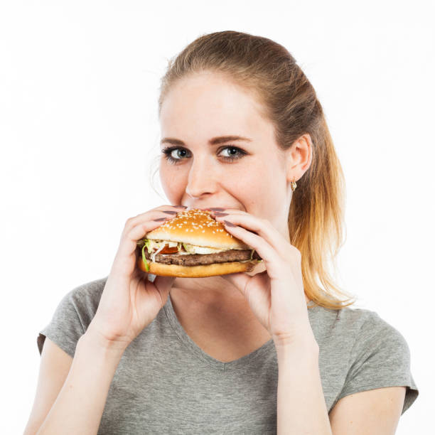 istock Cute girl with a hamburger 918537142