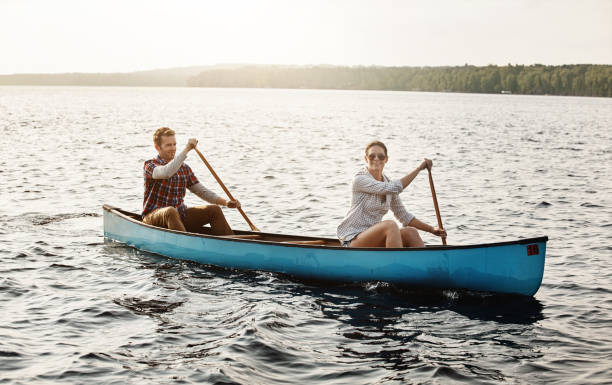 istock Laid back canoe rides out on the lake 918537842