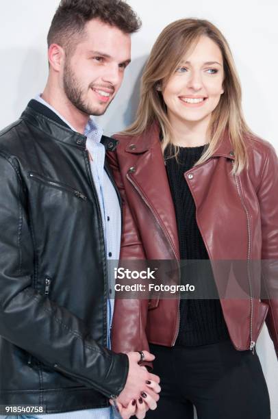 Portrait Of A Mid Adult Man And A Young Woman Smiling Stock Photo - Download Image Now