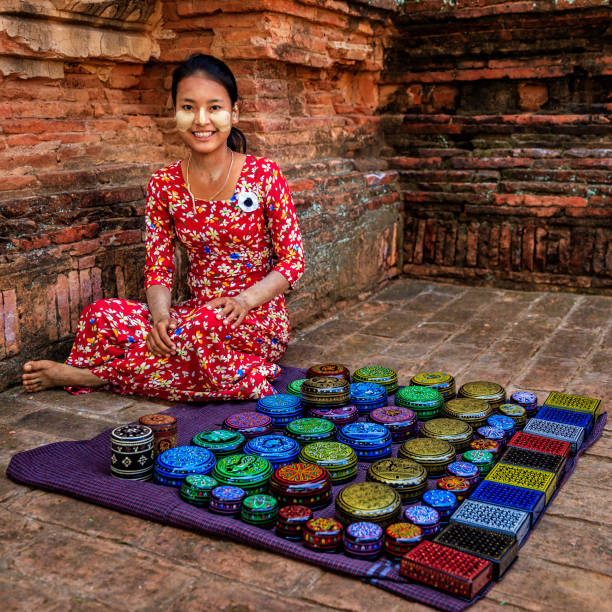 istock Young Burmese girl selling a lacquerware in Bagan, Myanmar 918541362