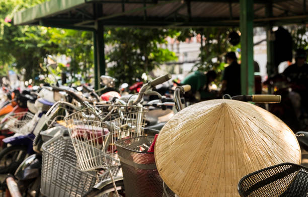 istock Vietnamese conical hat and bicycles, Vietnam. 918544720