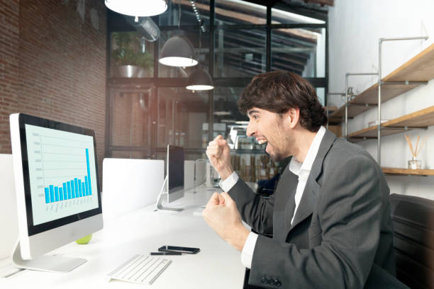 istock Excited finance director seeing the graph 918545142