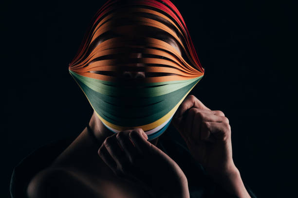 istock woman wearing colored quilling paper on head isolated on black 918545864