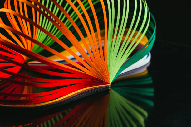 istock colored quilling paper curves on black 918548022