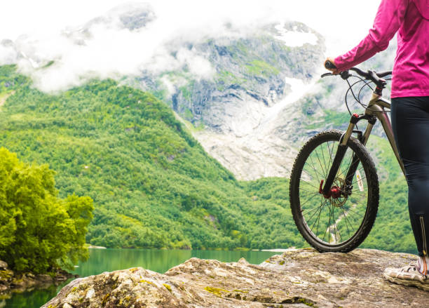 istock Biking in Norway against picturesque landscape 918555590