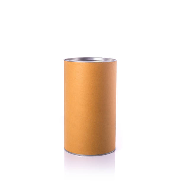 istock New brown round paper box with silver cap. Studio shot isolated on white 918556296