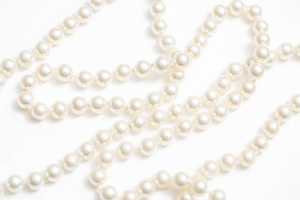 istock Pearls White Background On A Necklace 918556940