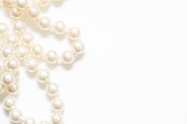 istock Pearls White Background On A Necklace 918557790