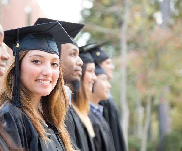 istock Latin descent female college student graduation on campus. 918565124
