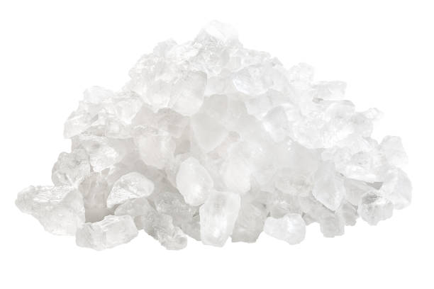 istock Coarse rock sea salt pile, paths 918565208