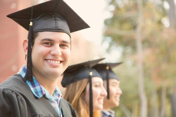 istock Latin descent male college student graduation on campus. 918565282